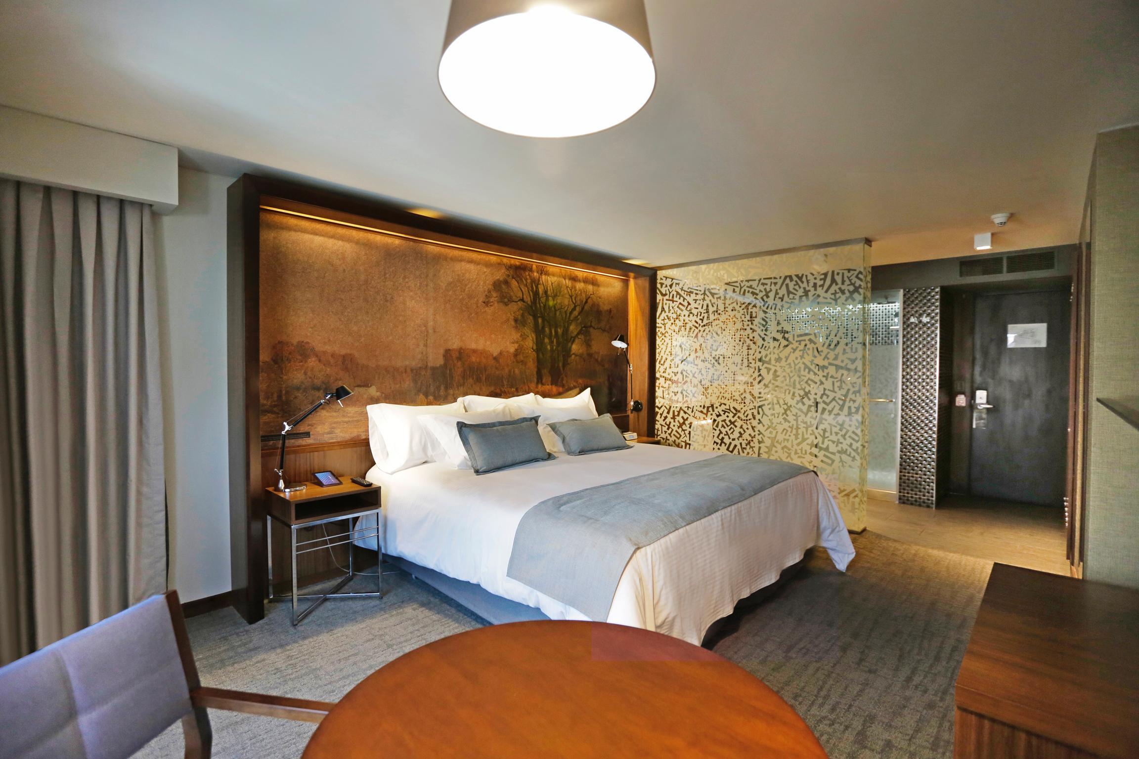 Hotel Cumbres Lastarria Santiago Kültér fotó A room at the hotel