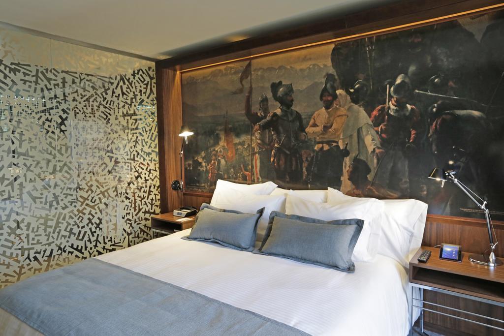 Hotel Cumbres Lastarria Santiago Kültér fotó A room at the hotel